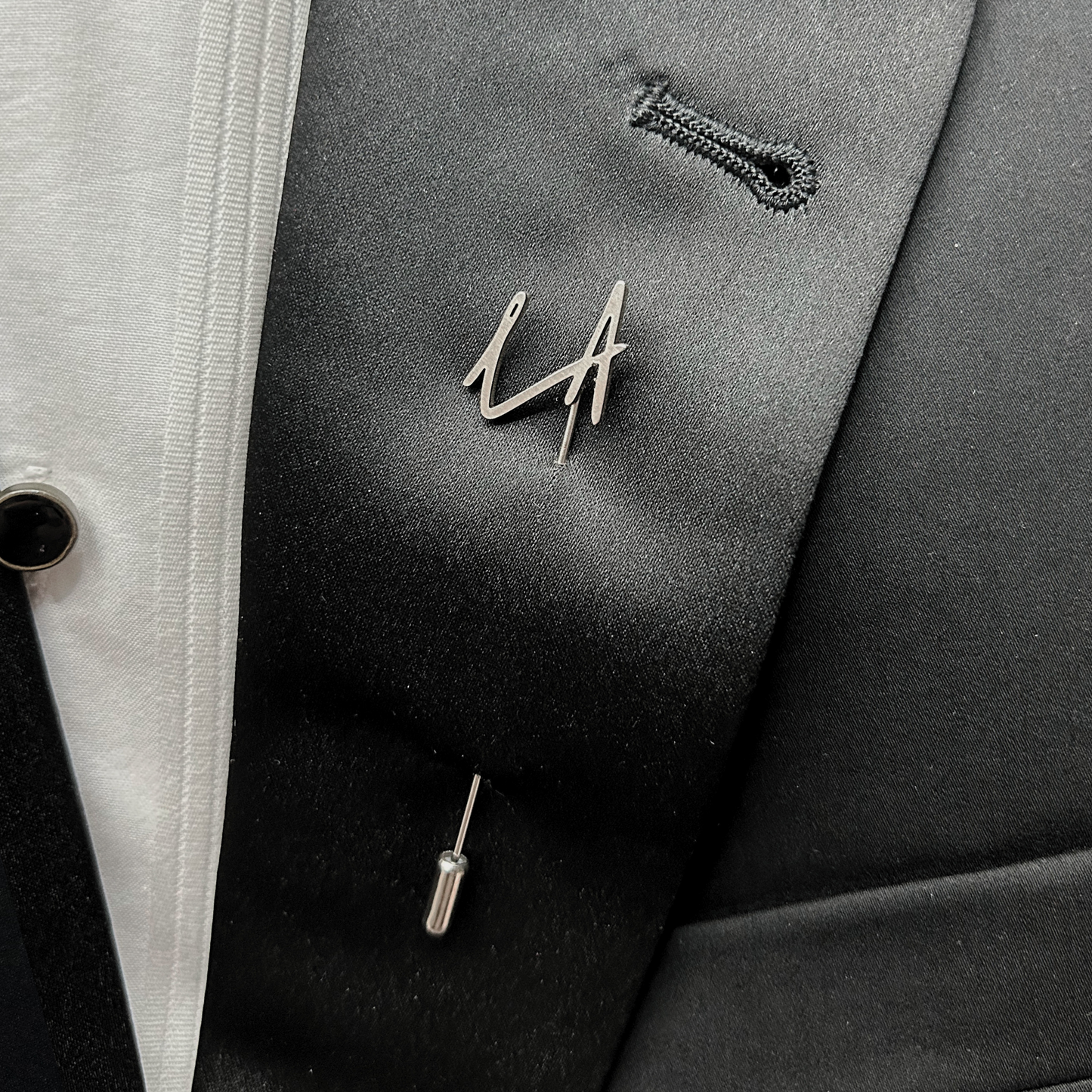 Boutonnier personalizado en acero inoxidable