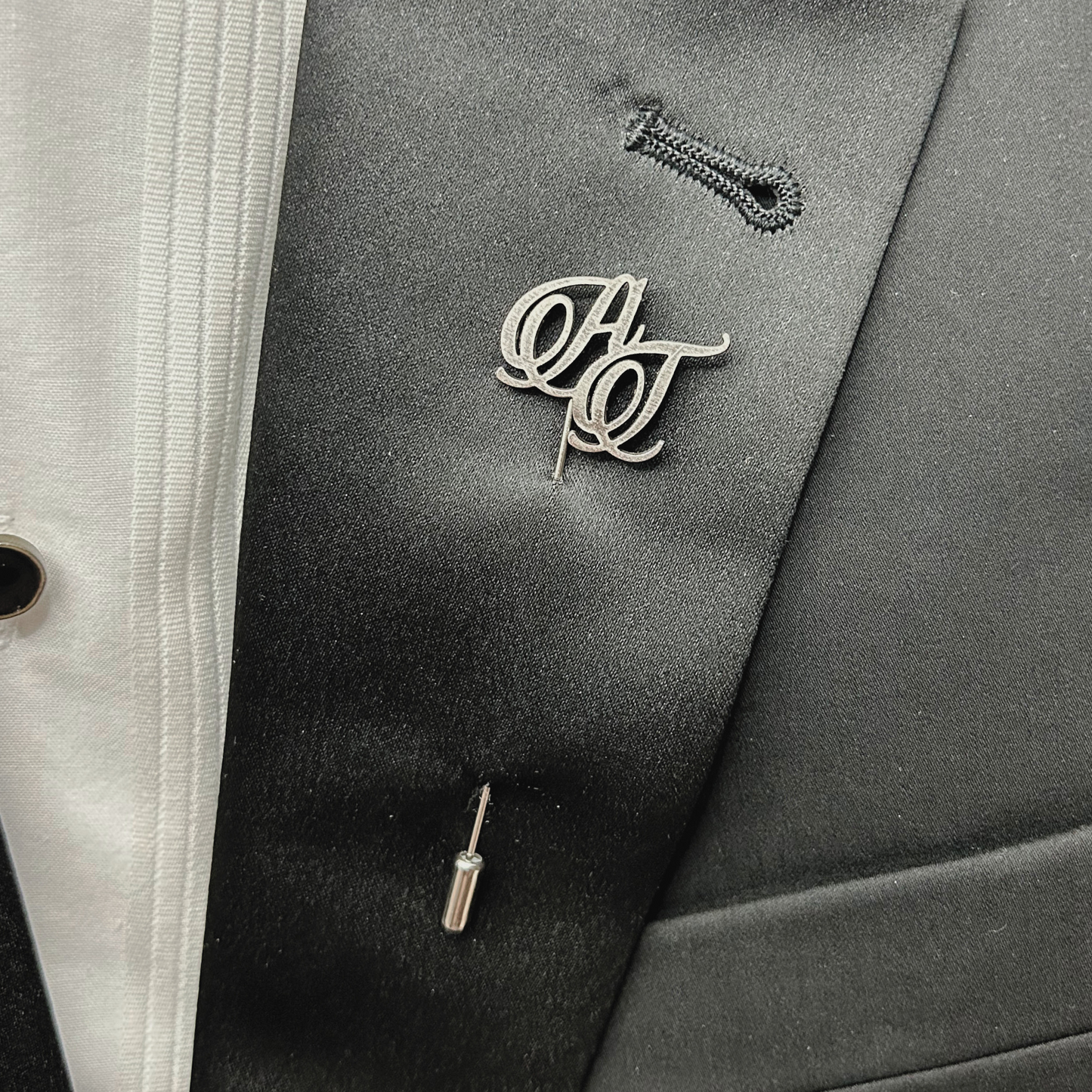 Boutonnier personalizado en acero inoxidable